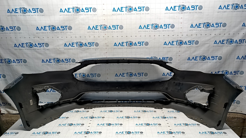 Front bumper bare Ford Fusion mk5 19-20 without parking sensors and towing hook, blue FT, rubbed