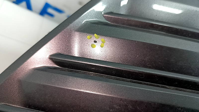 Lower grille in front of bumper Toyota Camry v70 18-20 hybrid XLE, under parking sensors, broken mount, pressed, scratches, bumps