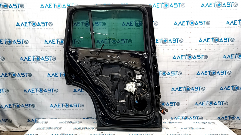 Door assembly rear left VW Tiguan 09-17 black LC9X, worn trim, butt
