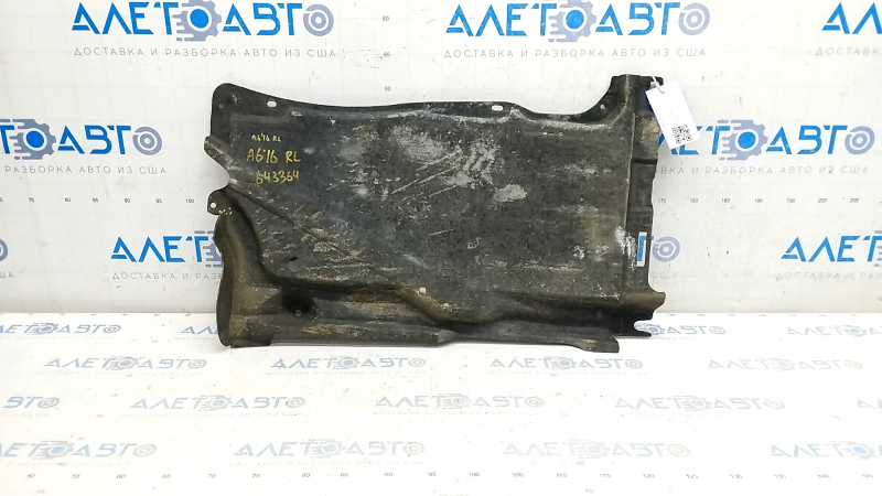 The rear left underbody protection of the Audi A6 C7 12-18 is torn and pressed