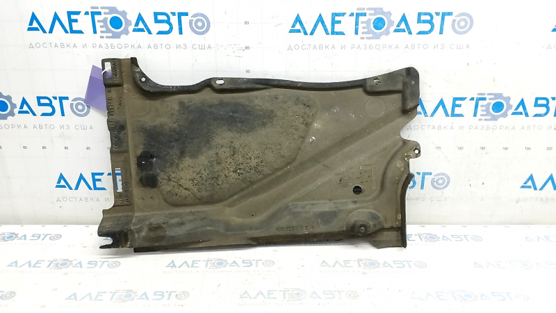 The rear left underbody protection of the Audi A6 C7 12-18 is torn and pressed