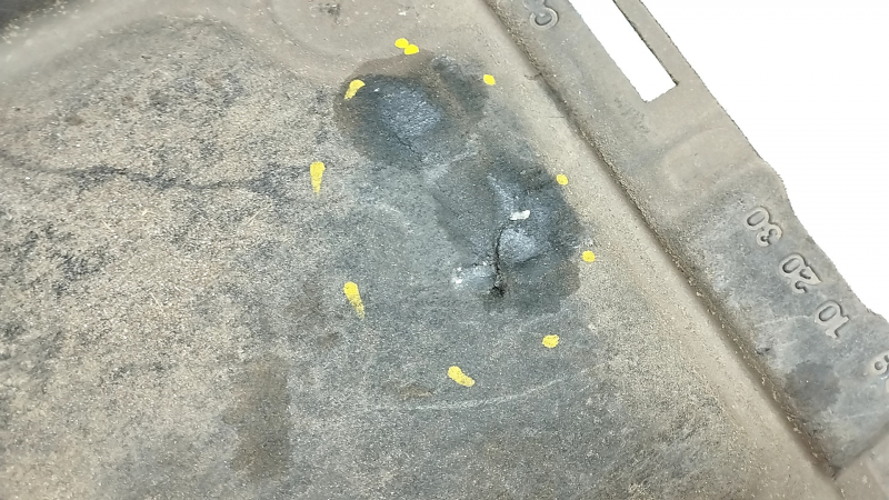 The rear left underbody protection of the Audi A6 C7 12-18 is torn and pressed