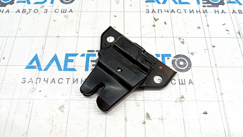 Tesla Model S 12-15 hood lock on two hinges, small, pre-restoration, cracked body