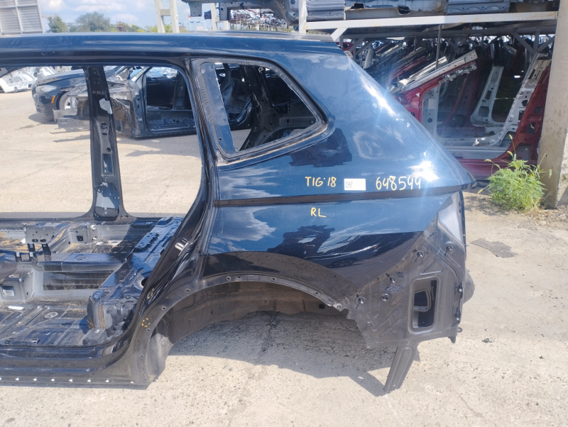 Quarter wing rear left VW Tiguan 18-long on the body, black, painted, pokes