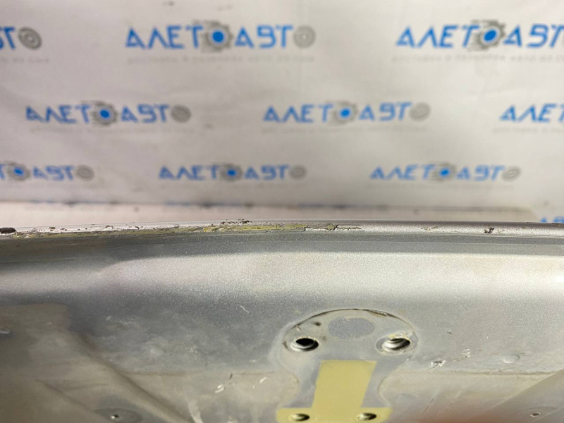 The hood is bare Tesla Model S 12-15 pre-rest aluminum silver PMSS, pokes hail, peeled paint