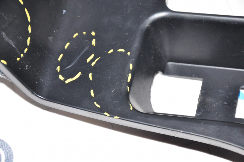 Tesla Model S 12-20 lower passenger footwell dashboard trim scratches, dented mount used