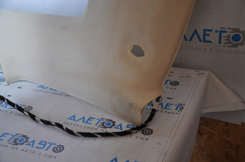 Tesla Model S 12-15 ceiling trim pre-restoration, under panorama, beige, under chemical treatment, tear of fastening, fabric peeled off