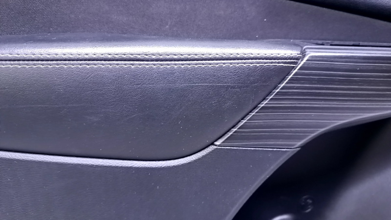 Door trim card front left Jeep Cherokee KL 14-18 black with black insert cloth, armrest black leather, molding wood color, dent, abrasions, scratches, scuffs