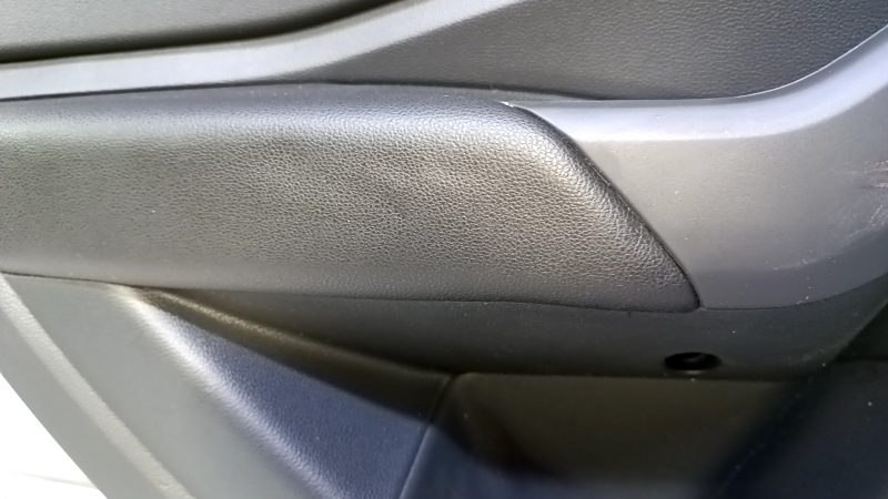 Door trim card rear left VW Jetta 19- black with black insert plastic, armrest black leather, scuffs, dent