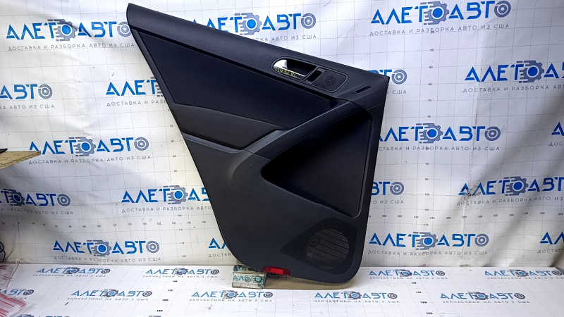 Door trim card rear left VW Tiguan 09-17 black, with black insert cloth, armrest black cloth, scratches, abrasions