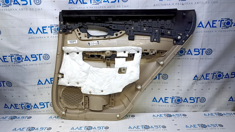 Door trim card rear left Nissan Rogue 14-20 beige with beige insert plastic, armrest beige leather, molding carbon glossy, scratches, abrasions, scuffs