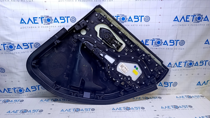Door trim card rear left Jeep Cherokee KL 14-18 black with black insert leather, armrest black leather, molding dark wood, scratches, abrasions, dents, bumps