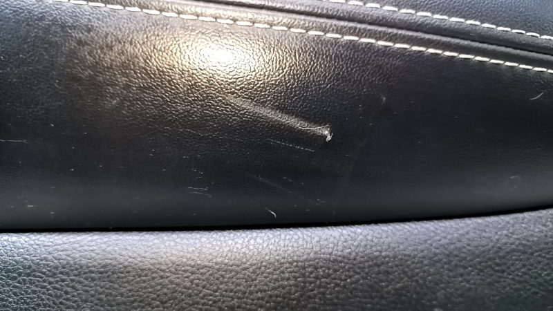 Door trim card rear left Jeep Grand Cherokee WK2 14-16 black with black insert leather, armrest black leather, white stitching, molding with chrome, under mat black wood, pokes, scuffs, scratches, scu