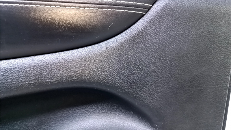 Door trim card rear left Jeep Grand Cherokee WK2 14-16 black with black insert leather, armrest black leather, white stitching, molding with chrome, under mat black wood, pokes, scuffs, scratches, scu