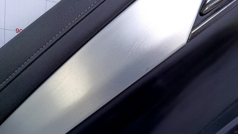 Door trim card rear left Cadillac ATS 13- black with black insert leather, armrest black leather, molding gray structure, abrasions, scratches, dents, pokes, scuffs