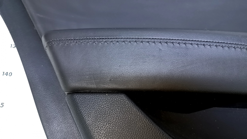 Door trim card rear left Cadillac ATS 13- black with black insert leather, armrest black leather, molding gray structure, abrasions, scratches, dents, pokes, scuffs
