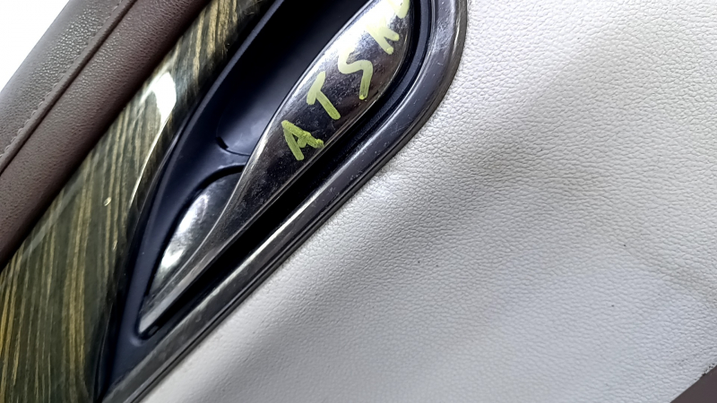Door trim card rear left Cadillac ATS 13- brown with gray insert leather, armrest brown leather, molding light wood gloss, dents, abrasions, cracked leather, pokes, scuffs