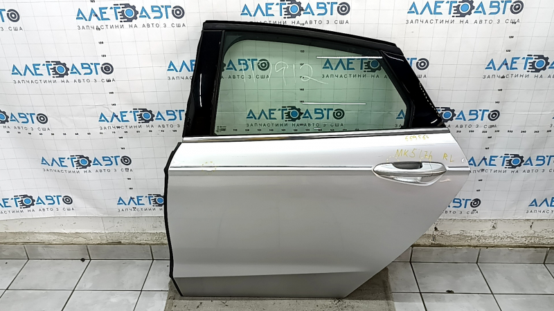 Door assembly rear left Ford Fusion mk5 13-20 silver UX, dent, bumps, cracks in the trim