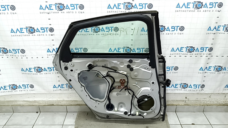Door assembly rear left Ford Fusion mk5 13-20 silver UX, dent, bumps, cracks in the trim