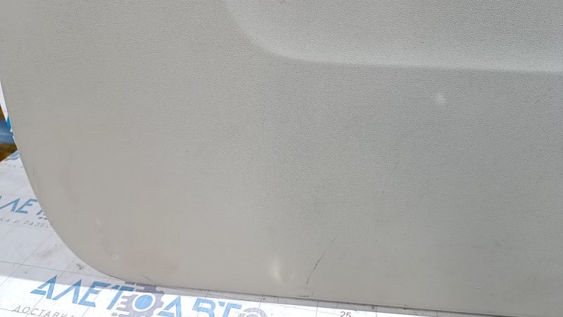 Lower trunk door trim Toyota Sienna 11-20 beige, plastic turned white, scratches, abrasions