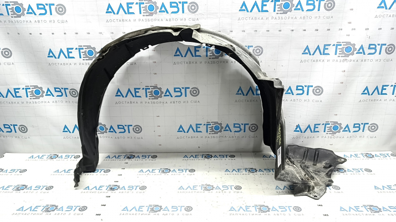 Front left fender liner Toyota Prius V 12-14 pre-restoration, tears, broken mudguard mounting bolt