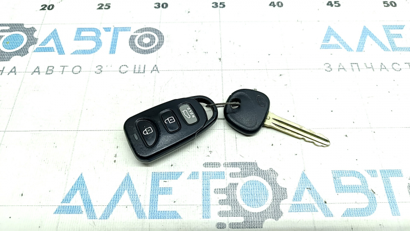 Key Hyundai Elantra AD 17-20 keychain + key, 4 buttons, worn