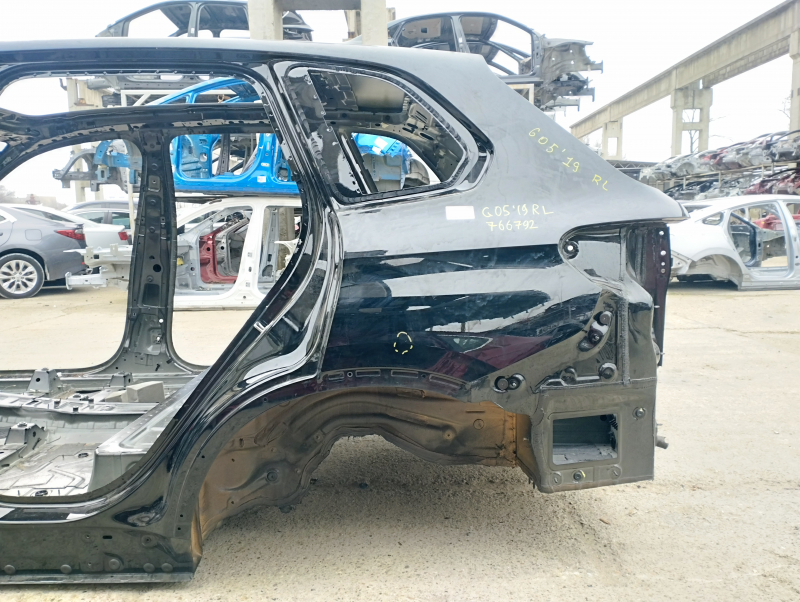 Quarter wing rear left BMW X5 G05 19-23 on the body, black, pokes