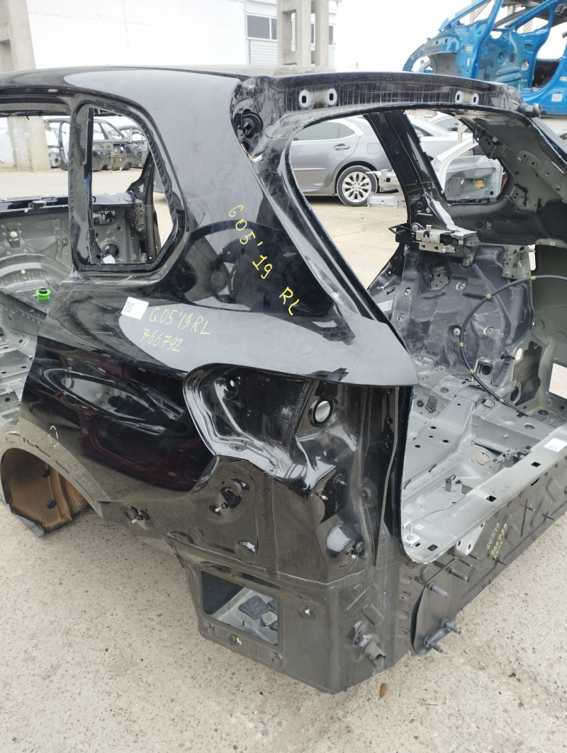 Quarter wing rear left BMW X5 G05 19-23 on the body, black, pokes