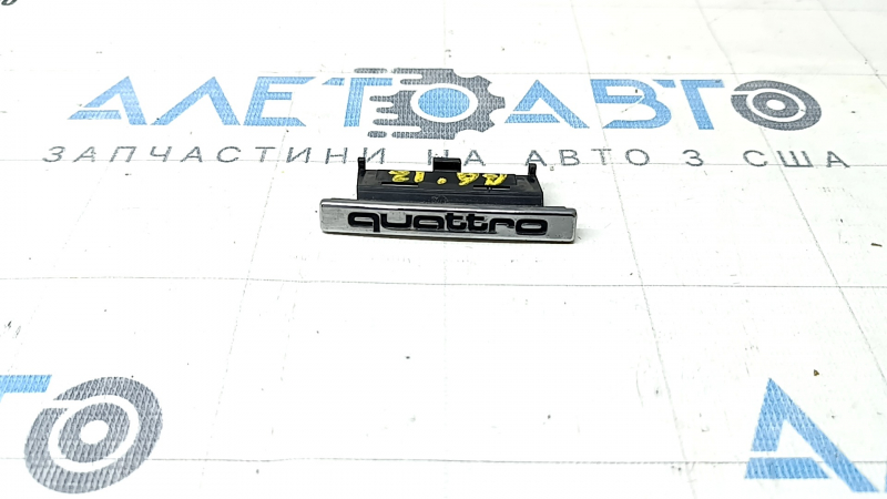 Emblem inscription "quattro" on the radiator grille Audi A6 C7 12-15 prerest