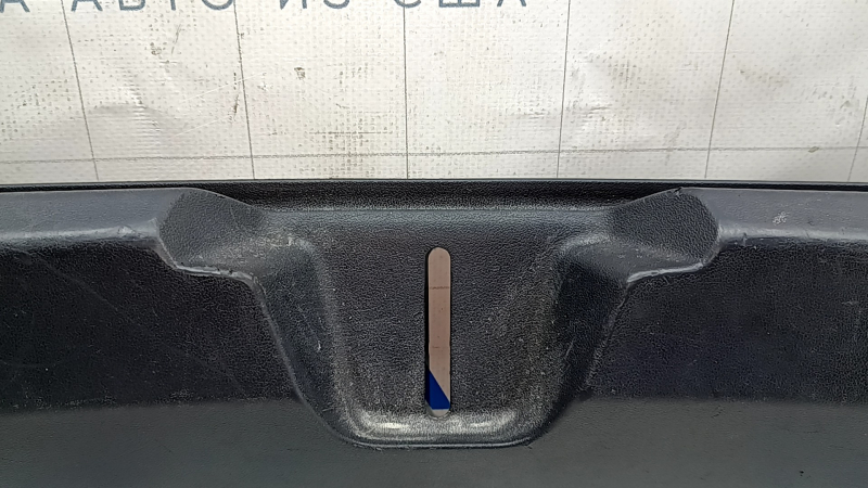 Tesla Model 3 18 rear trunk opening trim - black, scratches, scuffs, broken mount