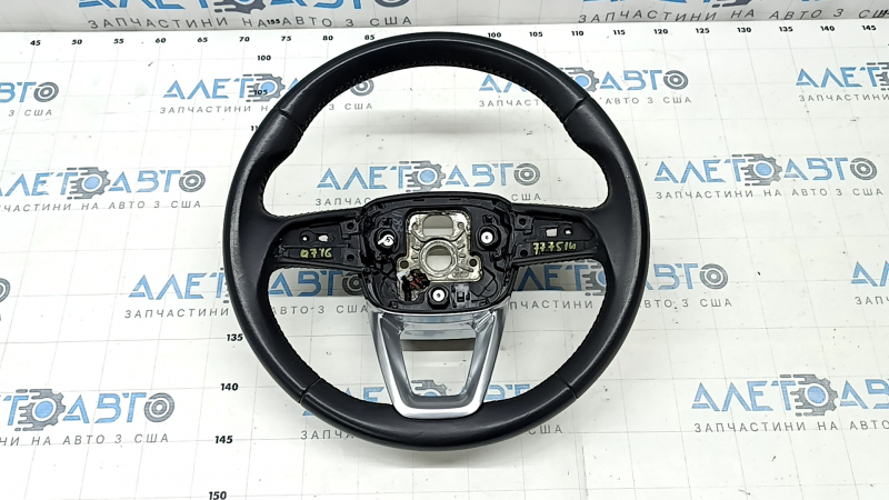 The steering wheel is bare, Audi Q7 16-19, black leather, heated, without buttons and paddles, bumps, scratches