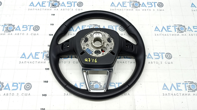 The steering wheel is bare, Audi Q7 16-19, black leather, heated, without buttons and paddles, bumps, scratches