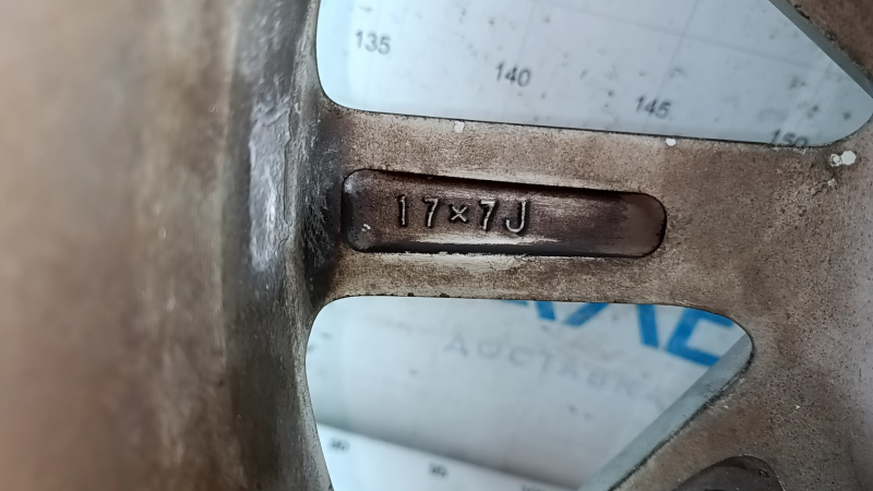 R17x7J Toyota Prius V 12-14 curb rim