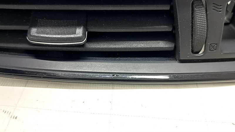 Nissan Rogue 17-19 front panel central air vent deflector, gloss black, coating bulged