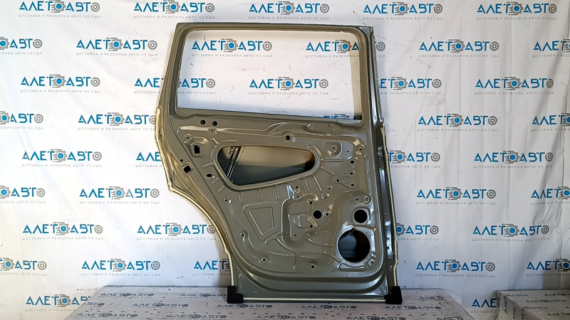 The door is bare, rear left, VW Tiguan 18-24, butt, dented sunset