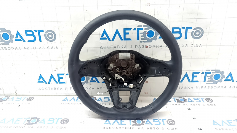 The steering wheel is bare, Volkswagen ID.4 23-25, black leather, heated, with scuffs.