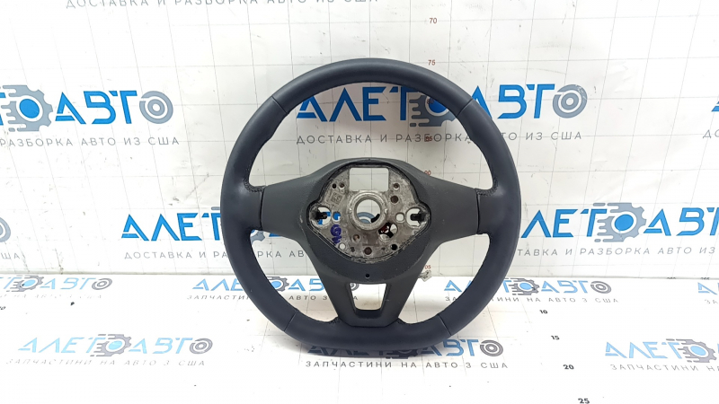The steering wheel is bare, Volkswagen ID.4 23-25, black leather, heated, with scuffs.
