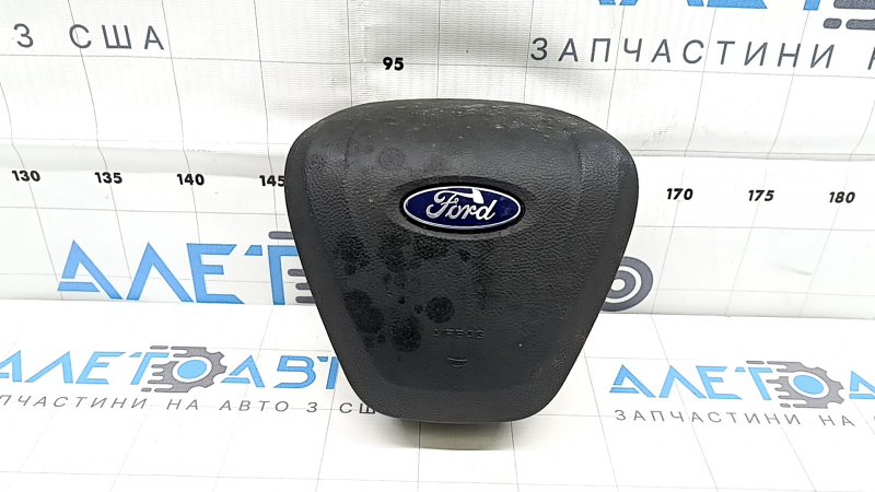 Black steering wheel airbag for the driver's side of a Ford Fusion mk5 17-20, dry-cleanable, rusty squib