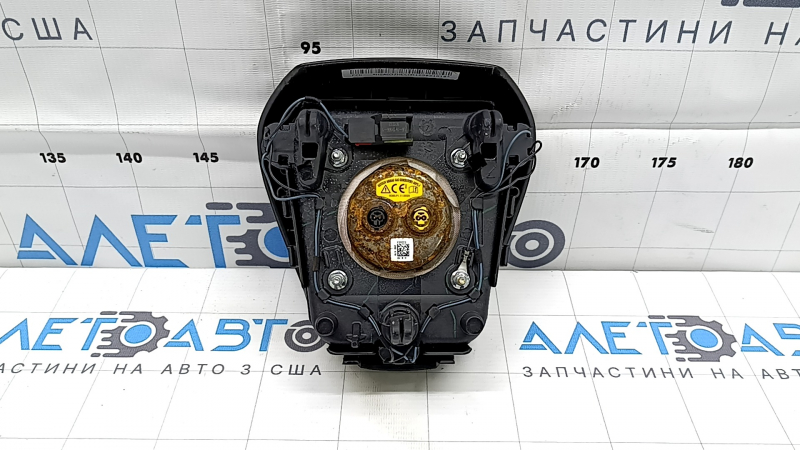 Black steering wheel airbag for the driver's side of a Ford Fusion mk5 17-20, dry-cleanable, rusty squib