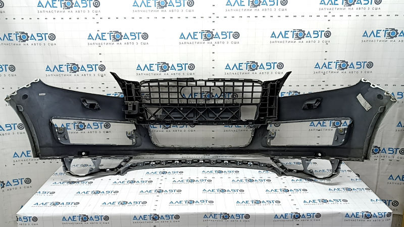 Bare front bumper for Audi Q7 4L 10-15 with parking sensors, white, dents, scratches, broken fasteners