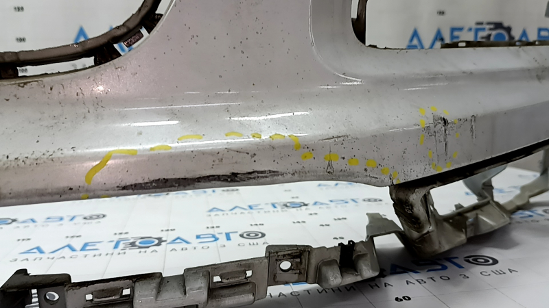 Bare front bumper for Audi Q7 4L 10-15 with parking sensors, white, dents, scratches, broken fasteners