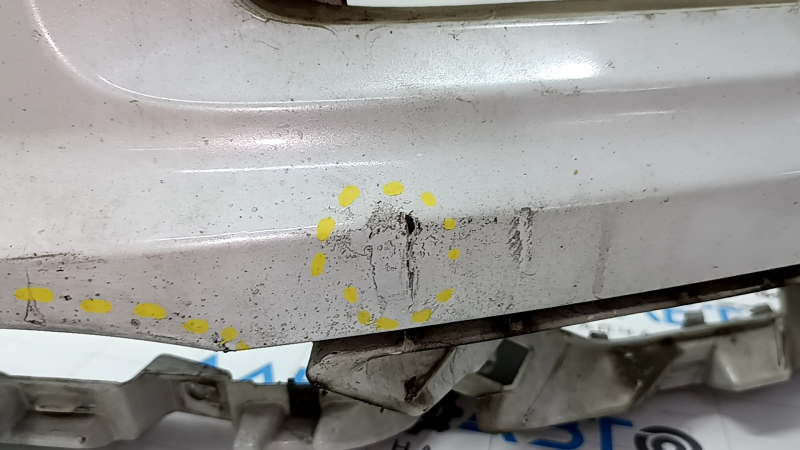 Bare front bumper for Audi Q7 4L 10-15 with parking sensors, white, dents, scratches, broken fasteners