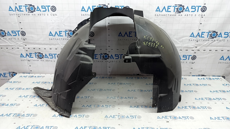 Volvo XC90 16-23 front left fender liner with tears