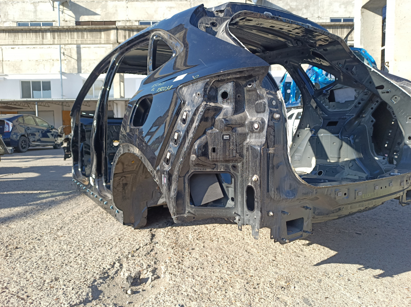 Quarter wing rear left Ford Escape MK4 20-24 on the body, black, pokes