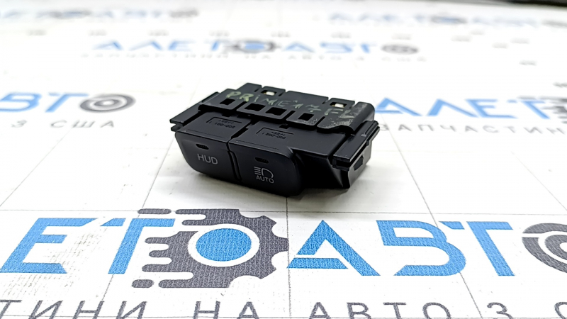 The high beam button for the Toyota Prius 50 Prime 17-18 is projected