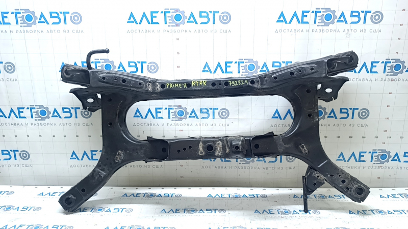 The rear subframe of a Toyota Prius 50 Prime 17-22 FWD is rusty.