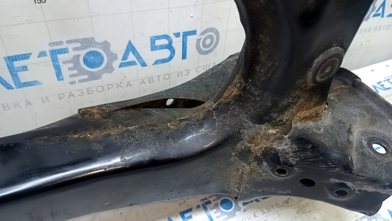 The rear subframe of a Toyota Prius 50 Prime 17-22 FWD is rusty.