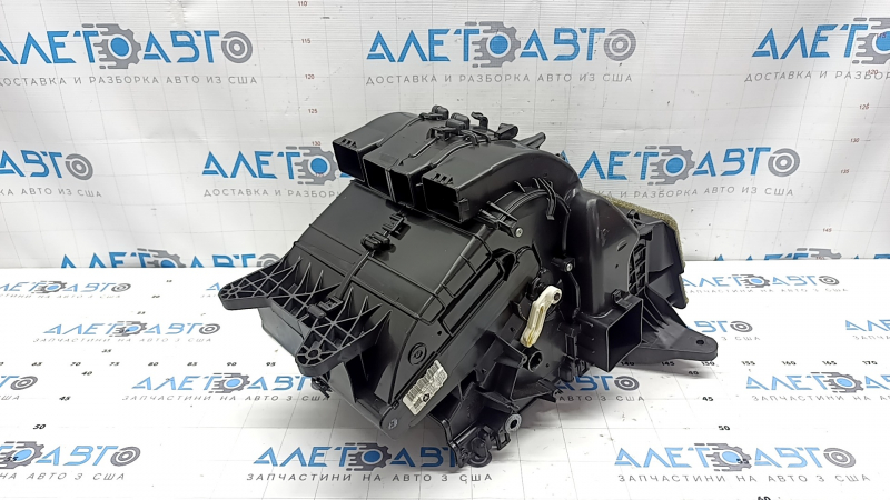 The bare heater housing of the Jeep Cherokee KL 19-23 air conditioner.