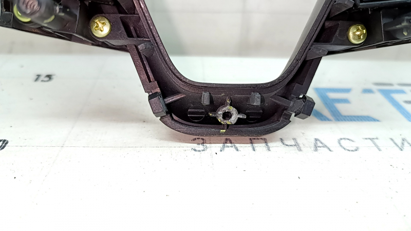 The steering wheel controls on a Hyundai Santa FE Sport 2017-2018 restyling have worn trim and broken fasteners.