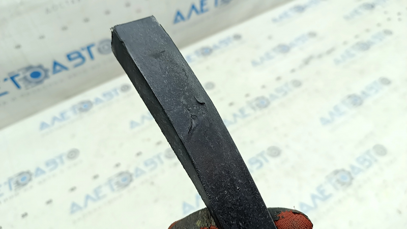 The front bumper lip of the Hyundai Santa FE Sport 13-18 type 2 is worn, the fastening is torn